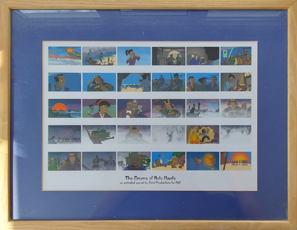 Photo of framed artwork courtesy of Calon TV - showing various frames from The Drums of Noto Hanto.